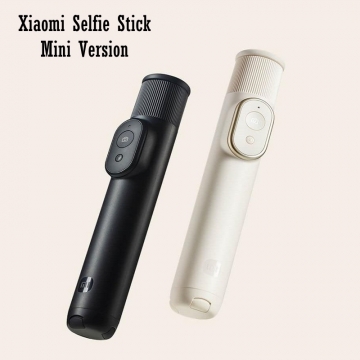 Монопод / штатив для селфі Xiaomi Selfie Stick Mini Version Монопод / штатив для селфі Xiaomi Selfie Stick Mini Version, модель XMZJZPGO2YM, сплав на основі анодованого алюмінія, монопод (селфі-палка), трипод (штатив), телескопічна конструкція, яка трансформується у штатив (ніжки штатива сховані в корпусі), силіконові накладки на ніжки проти ковзання, тримач для смартфона з поворотним механізмом на 90° вліво і на 90° вправо, знімний bluetooth пульт ДК, світловий індикатор на пульті, CR1632, розкладається на 520 мм, Київ, Киев